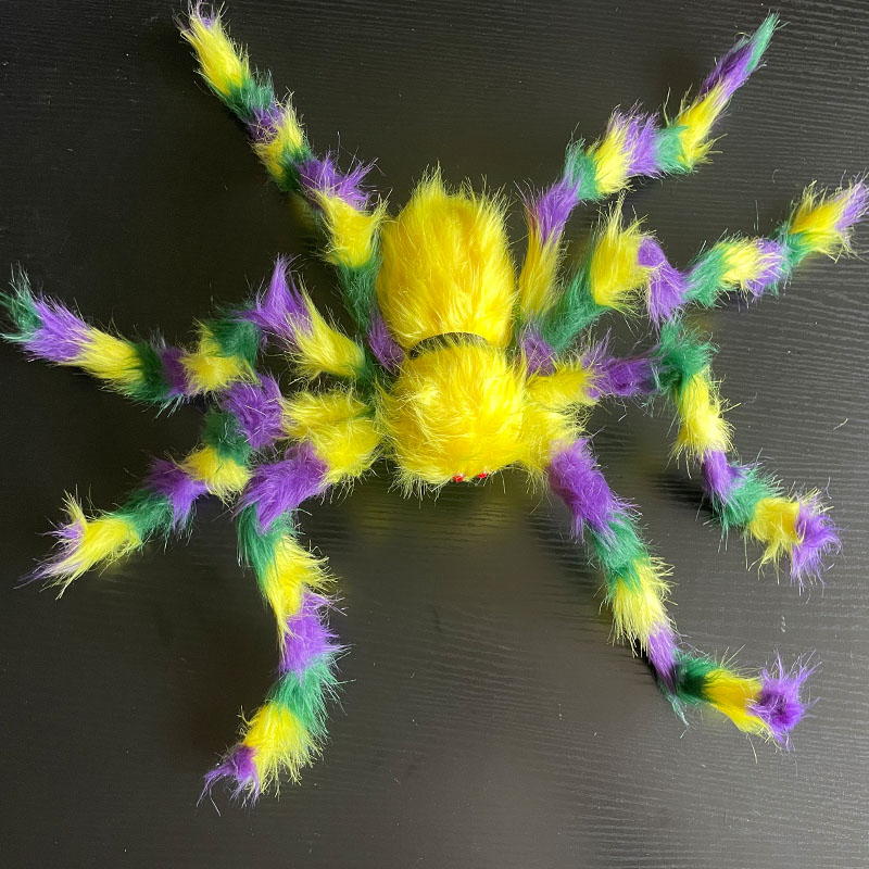 ハロウィーンカラフルな庭の屋外クモ